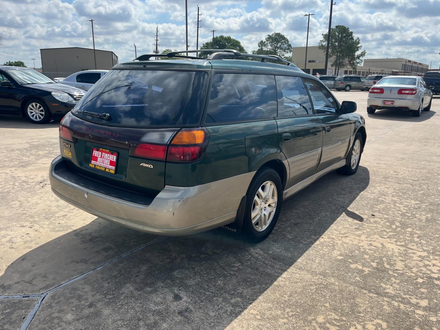 2003 green /TAN Subaru Outback Limited Wagon (4S3BH686737) with an 2.5L H4 SOHC 16V engine, 5-Speed Manual Overdrive transmission, located at 14700 Tomball Parkway 249, Houston, TX, 77086, (281) 444-2200, 29.928619, -95.504074 - Photo#6